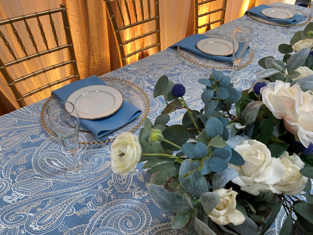 Ivory Paisley Lace Tablecover Over Slate Blue Solid Tablecover
